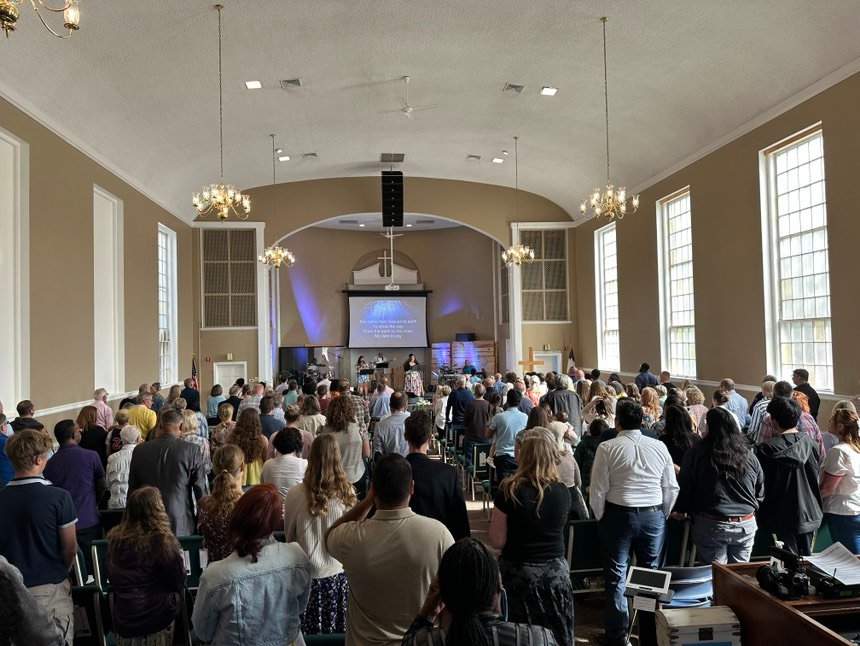 Congregation of people worshipping